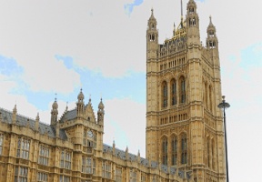 Johanna walking along the side of the Houses of Parliament